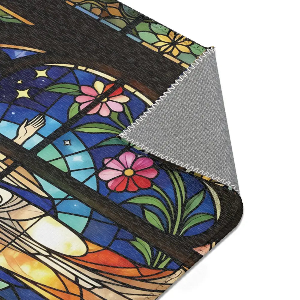 Stained-glass-patterned rug from Area Rug Divine Radiance by PixiOnyx Sacred Light Floor Art