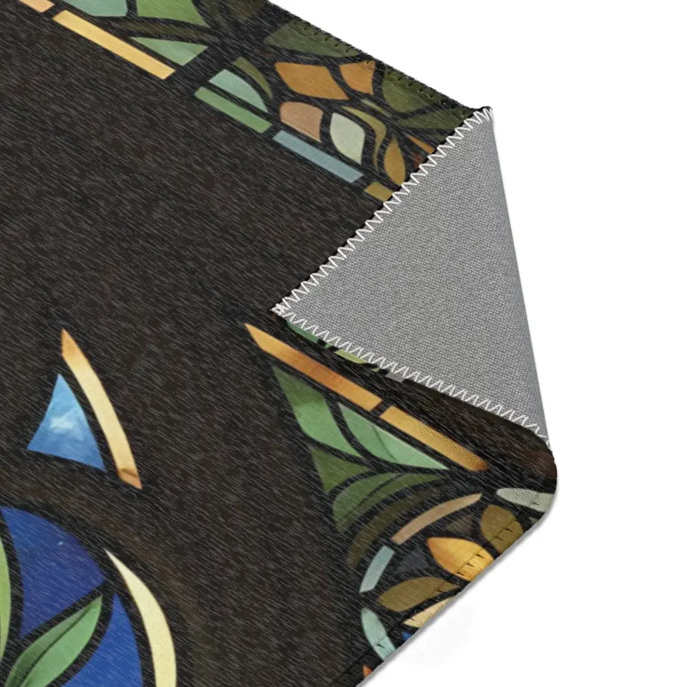 Stained-glass-patterned rug from PixiOnyx Sacred Light Floor Art named Divine Radiance
