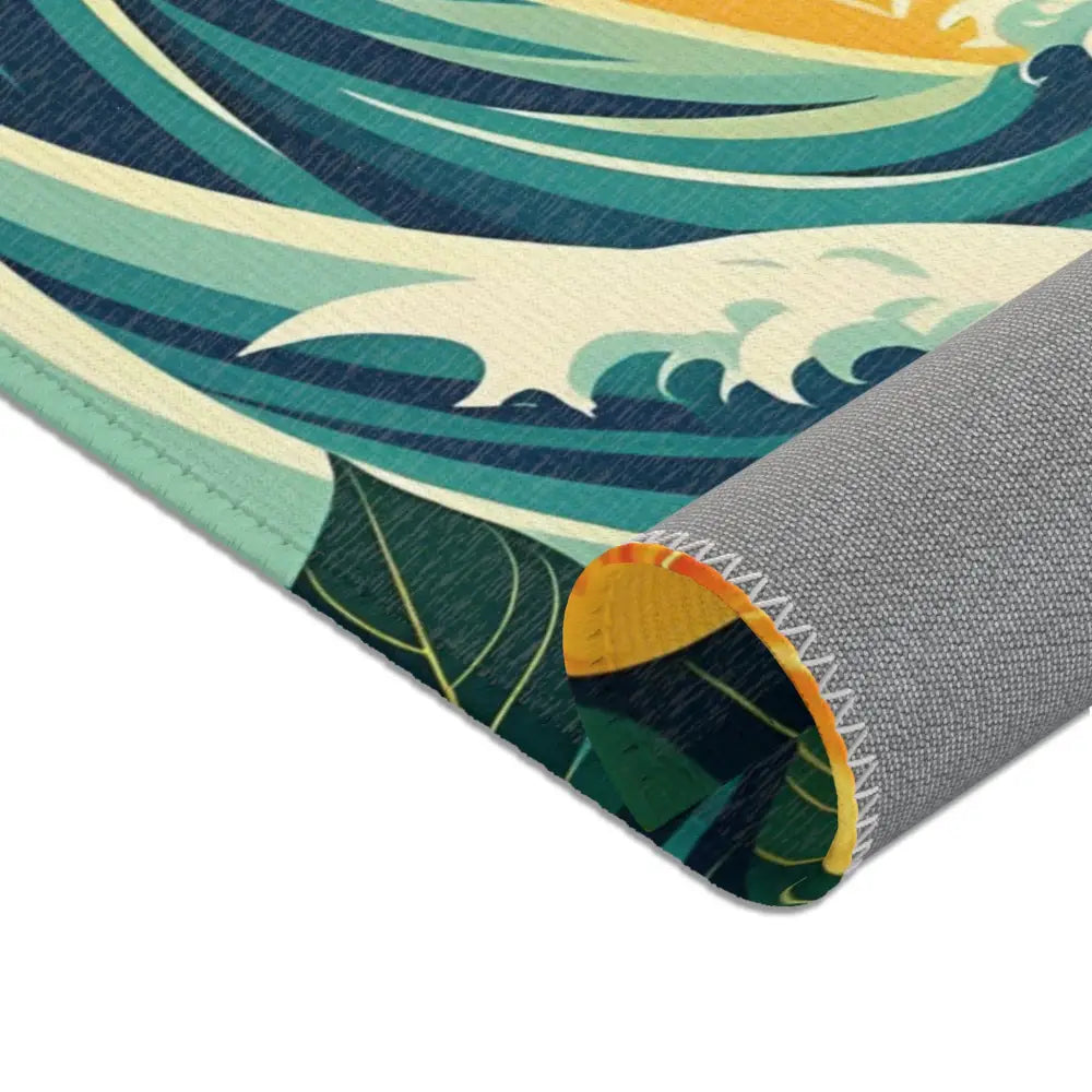 Rolled-up Tropical Wave Area Rug with leaf and wave pattern from PixiOnyx Coastal Dreamscape