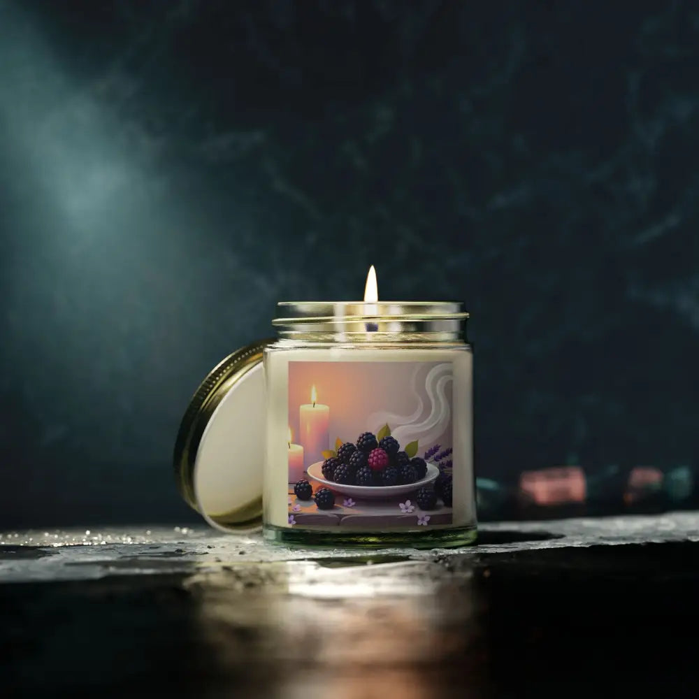 Lit blackberry-themed scented candle from PixiOnyx Aromatic Moodware for relaxing ambiance