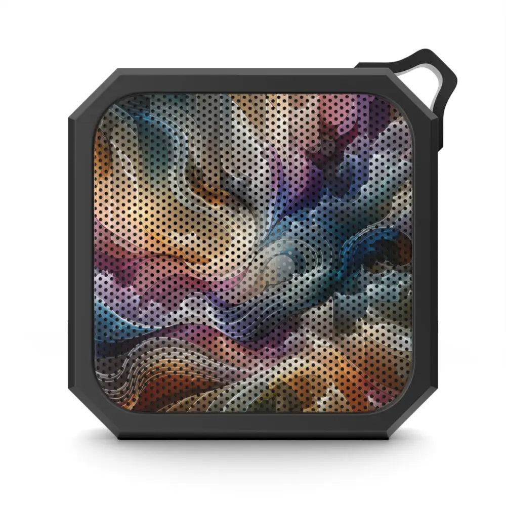 Square black portable Bluetooth speaker with colorful abstract design for outdoor audio