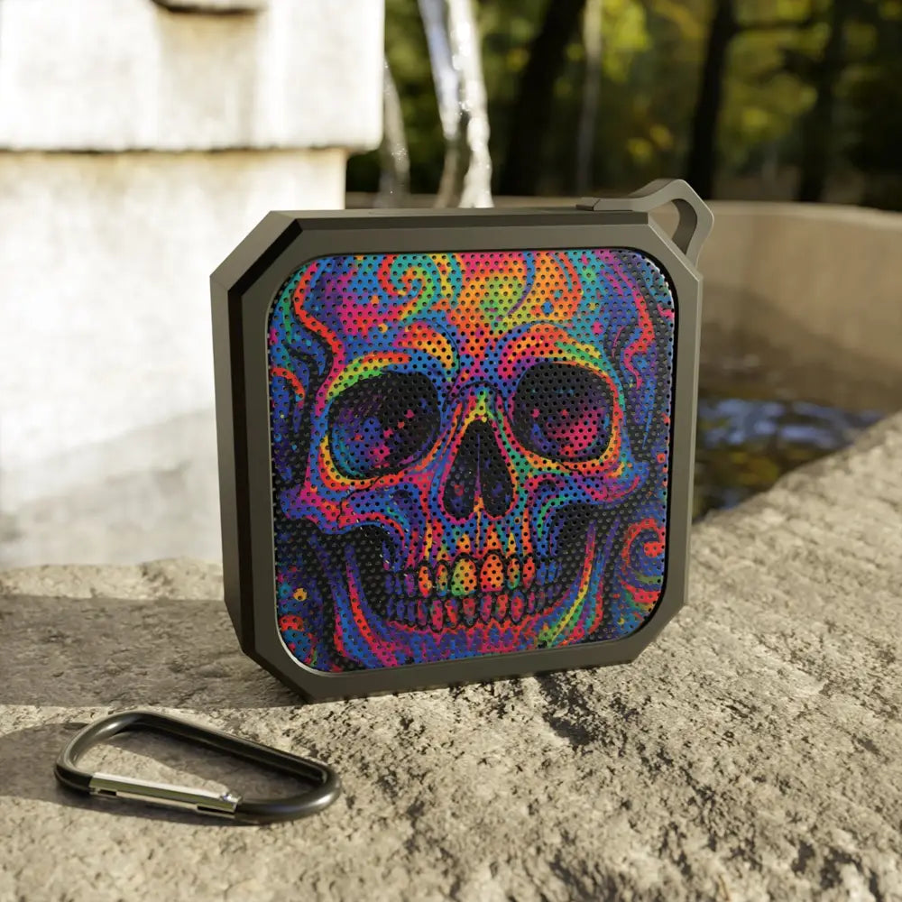 Square Bluetooth speaker with vibrant psychedelic skull design for festival audio vibes