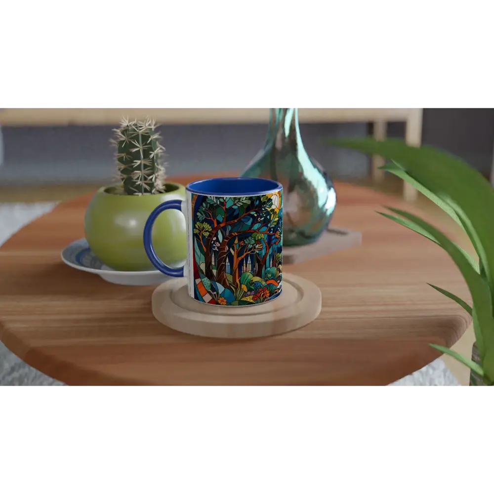 Blue-handled ceramic mug featuring a forest scene from PixiOnyx Stained Horizon collection