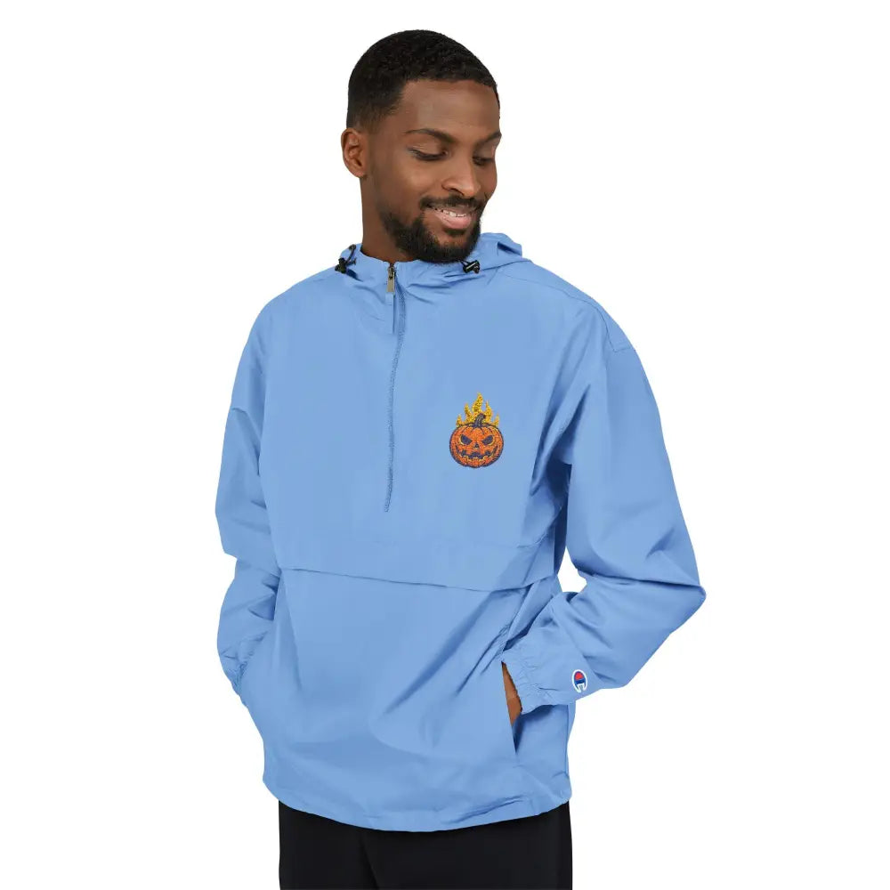 Light blue Champion Packable Anorak jacket with flaming pumpkin graphic for Halloween style