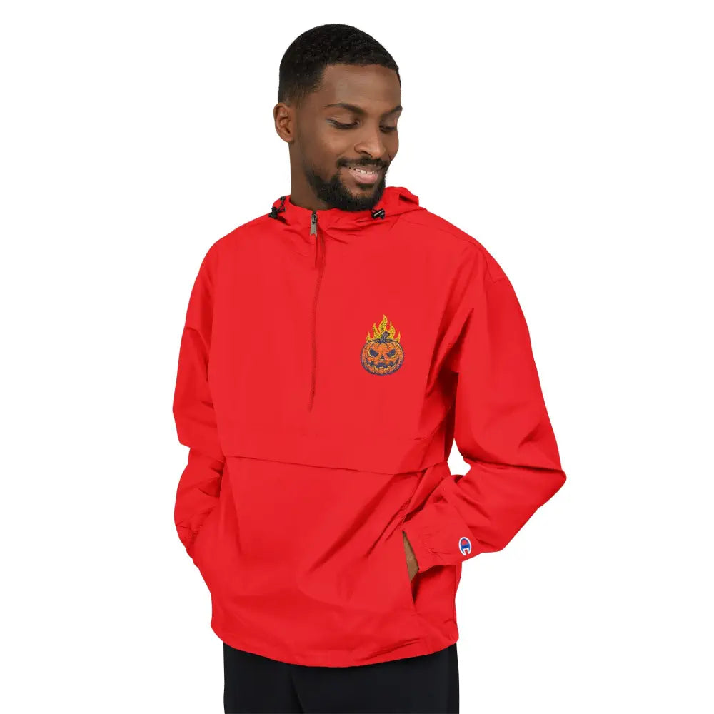 Man modeling Champion Packable Anorak Jacket with flaming pumpkin graphic for Halloween style
