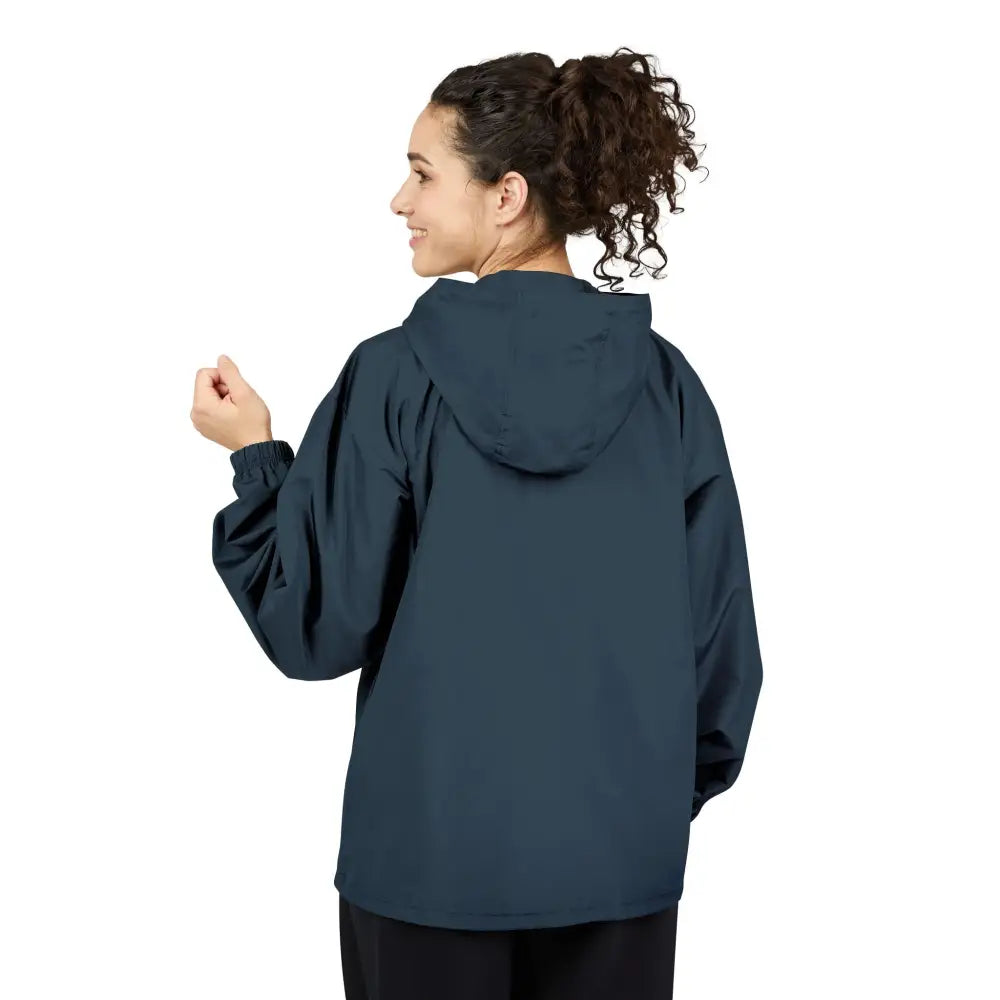 Woman wearing dark blue Champion Packable Anorak Jacket with flaming pumpkin design