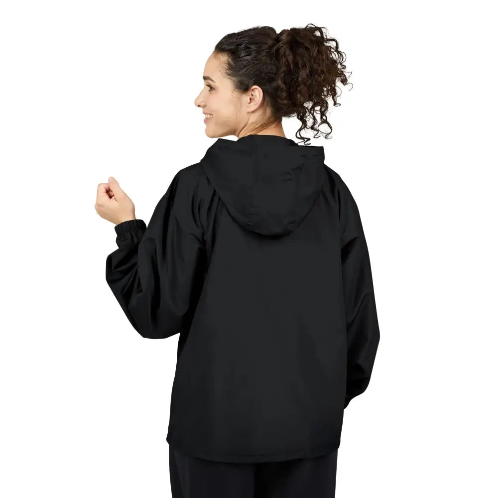 Smiling woman wearing Champion Packable Anorak Jacket Flaming Pumpkin Halloween Windbreaker