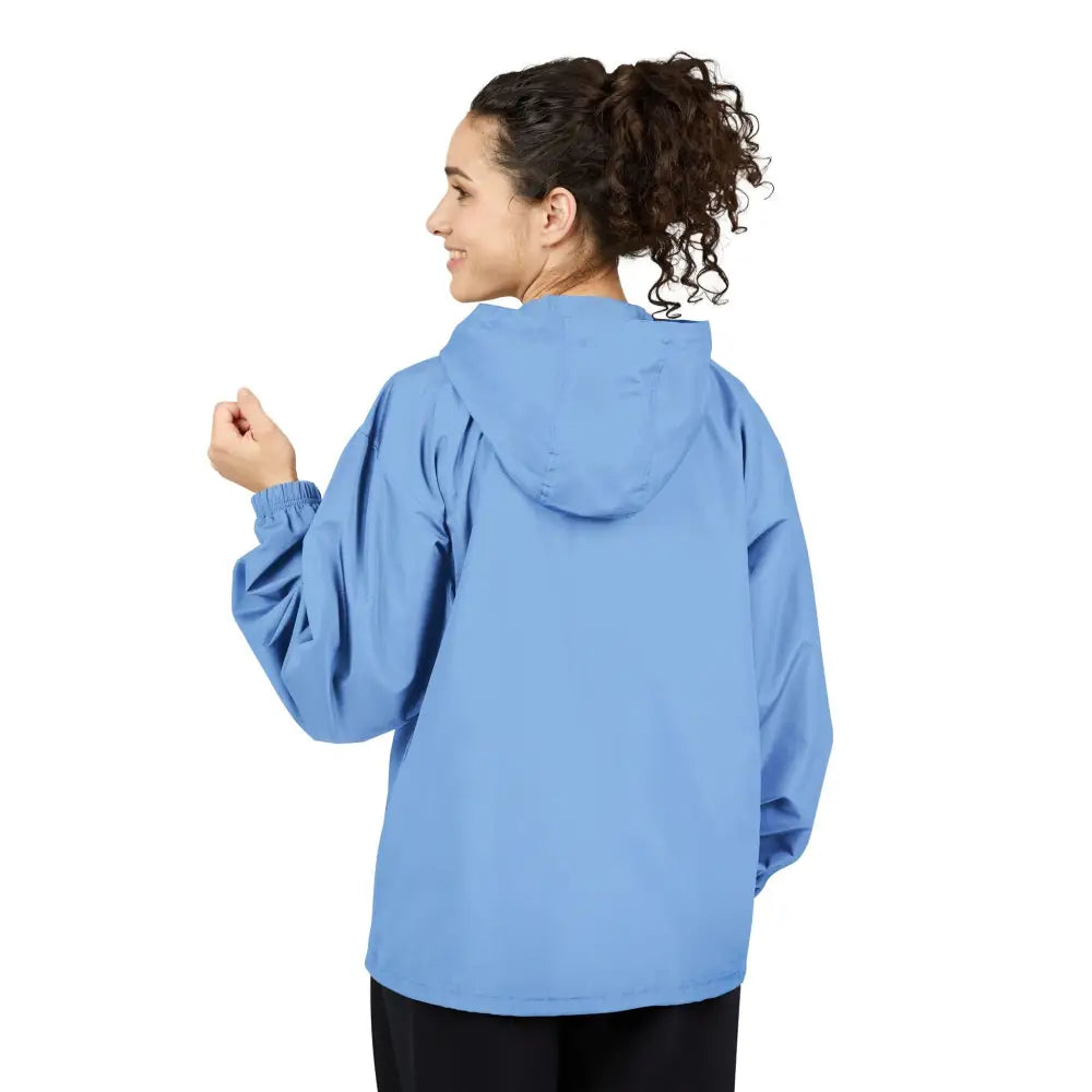 Light blue Champion Packable Anorak Jacket with flaming pumpkin design for Halloween streetwear
