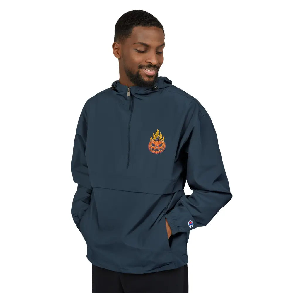 Dark blue Champion Packable Anorak Jacket with flaming pumpkin Halloween design for streetwear