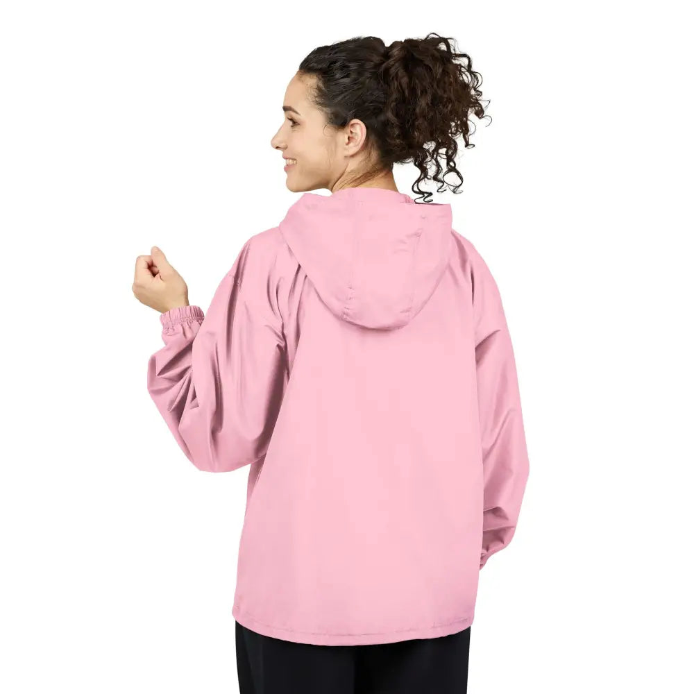 Pink hooded windbreaker jacket from Champion Packable Anorak collection featuring flaming pumpkin design