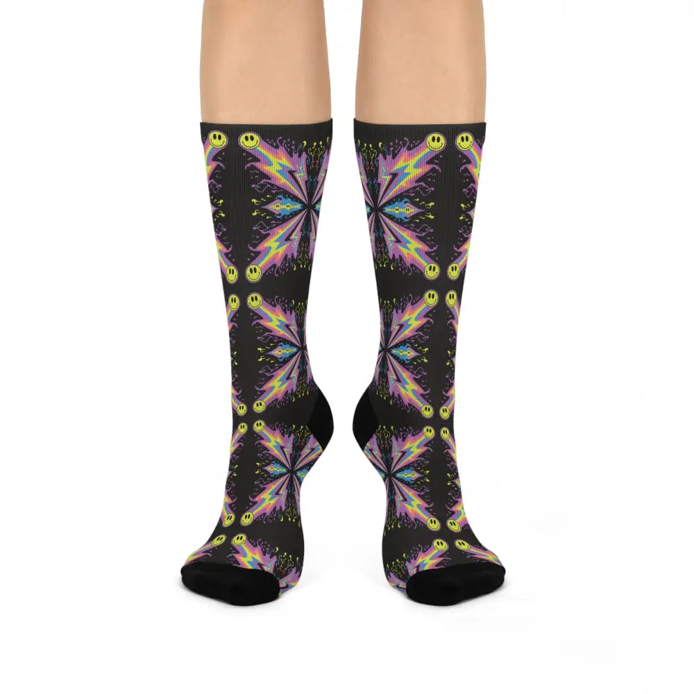 Black cushioned crew socks with neon smiley bolt and smiley bolt burst abstract pattern