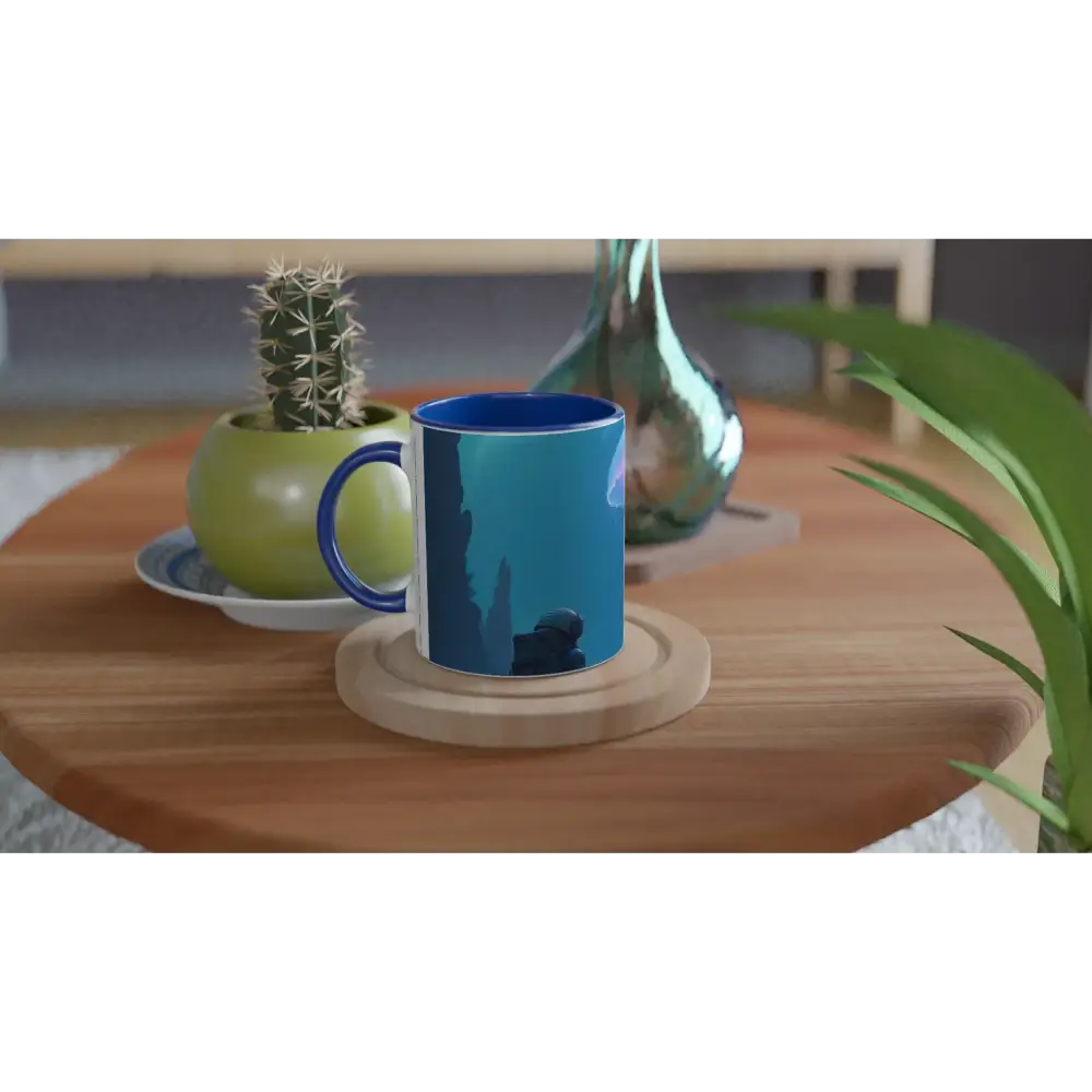 Blue-handled mug featuring an underwater scene from PixiOnyx Cosmic Glow Series