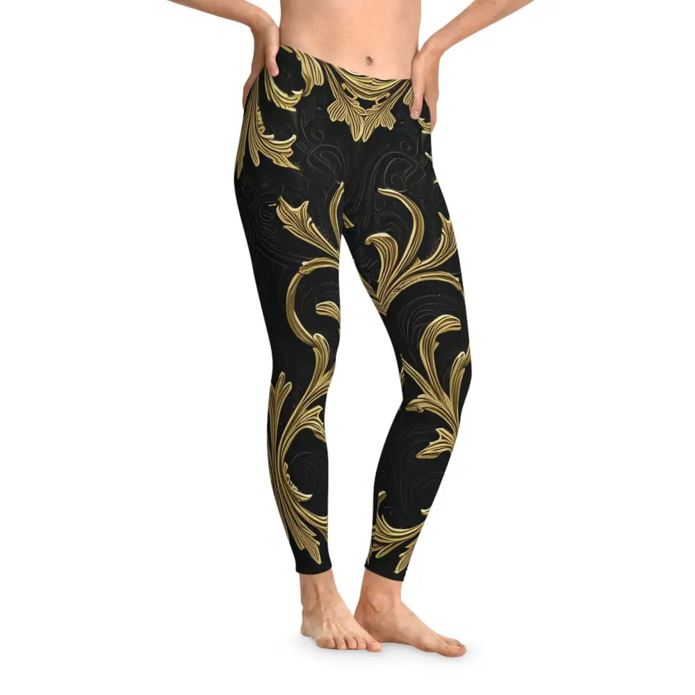 Black leggings with a gold floral pattern from PixiOnyx Active Collection
