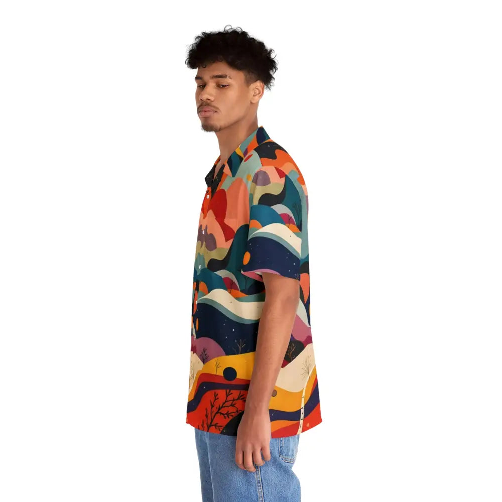 Man wearing colorful patterned Flowstate Mirage Hawaiian shirt with abstract urban camo design