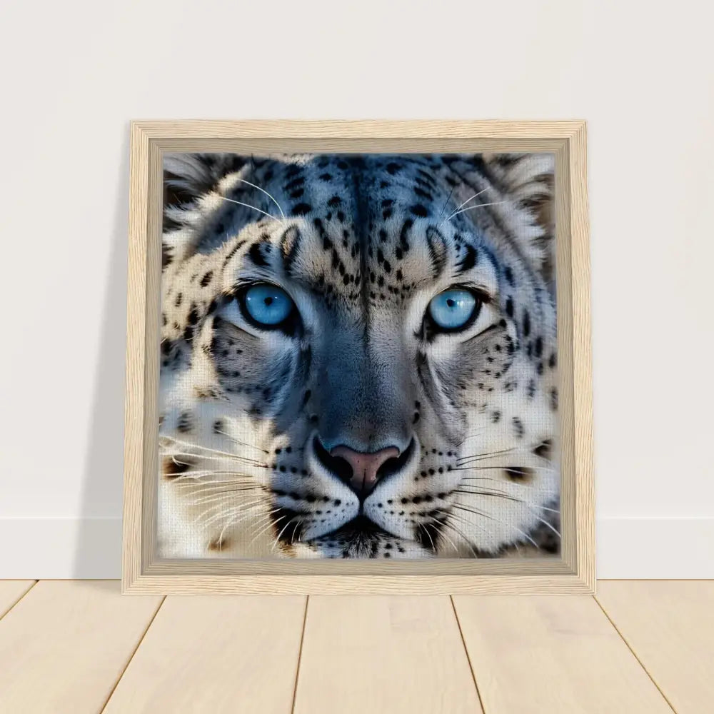 Framed snow leopard portrait on PixiOnyx canvas showcasing precision predator display