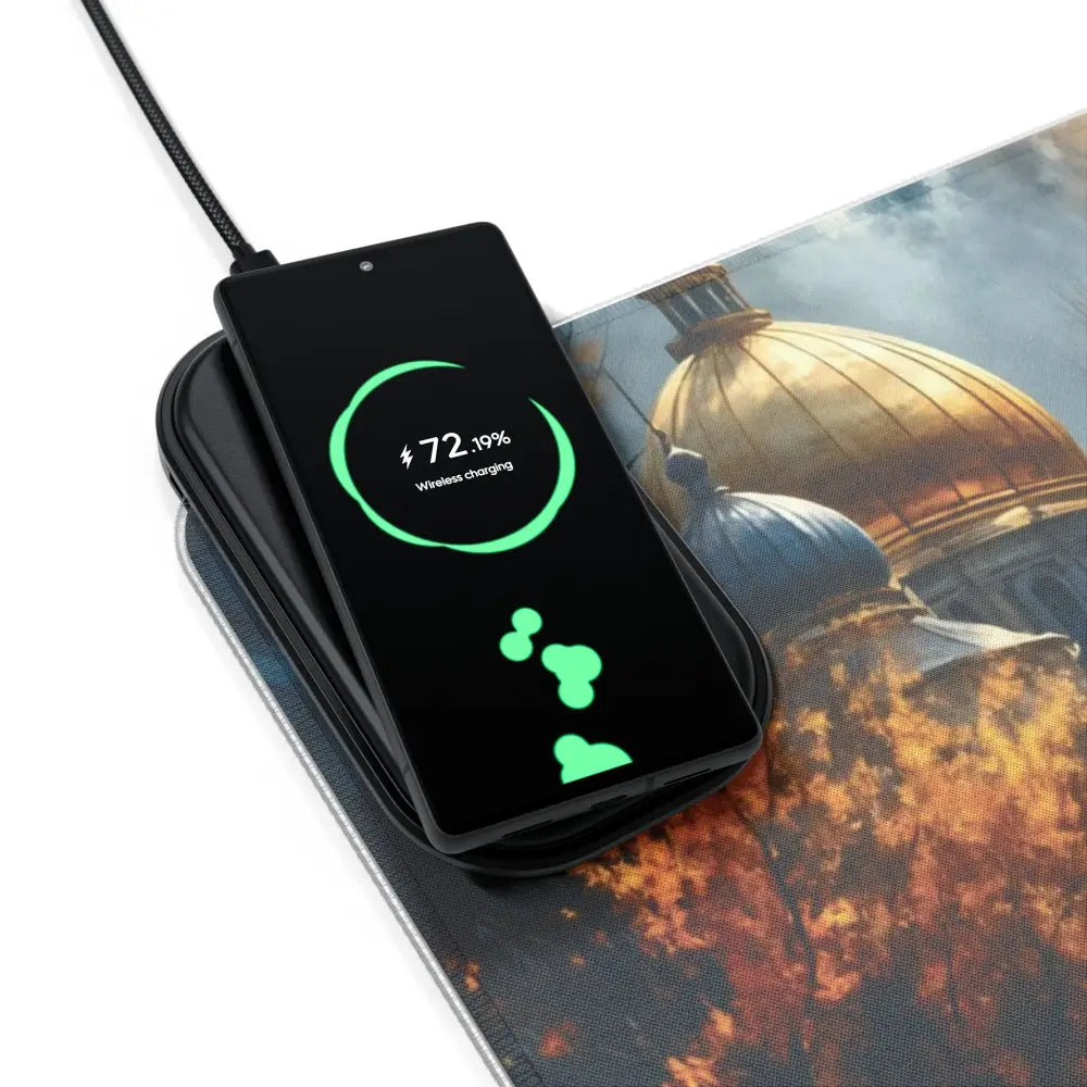 Black smartphone wirelessly charging on PixiOnyx Luminous Charge Deck with surreal skyline glowing