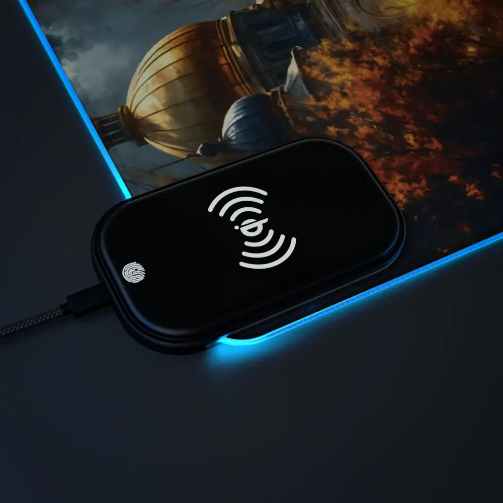Black wireless charging pad with blue LED lighting from Gaming Mouse Pad Echoes of Gold and Sky