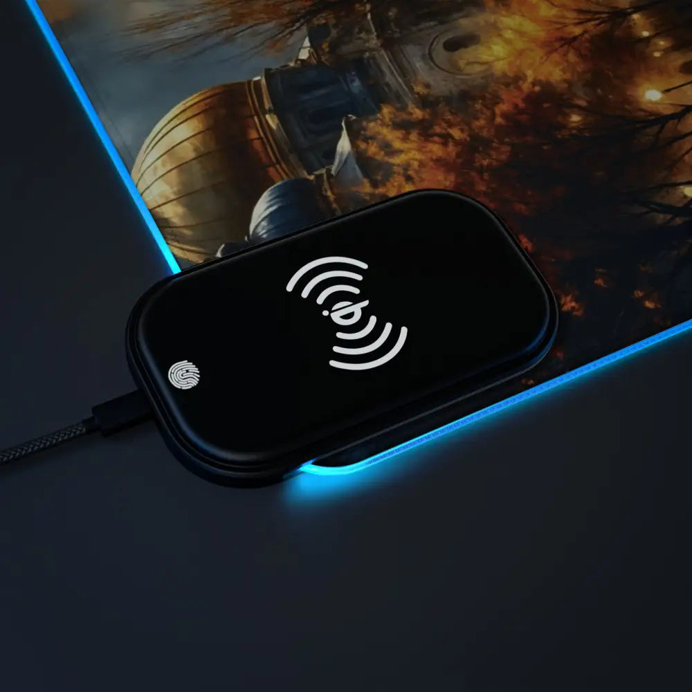 Black wireless charger with glowing blue base on Gaming Mouse Pad Echoes of Gold and Sky
