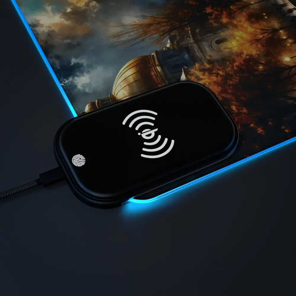 Black wireless charging pad with blue LED light strip from Gaming Mouse Pad – Echoes of Gold and Sky, blending cityscape meets cyberspace with surreal skyline glowing ambiance