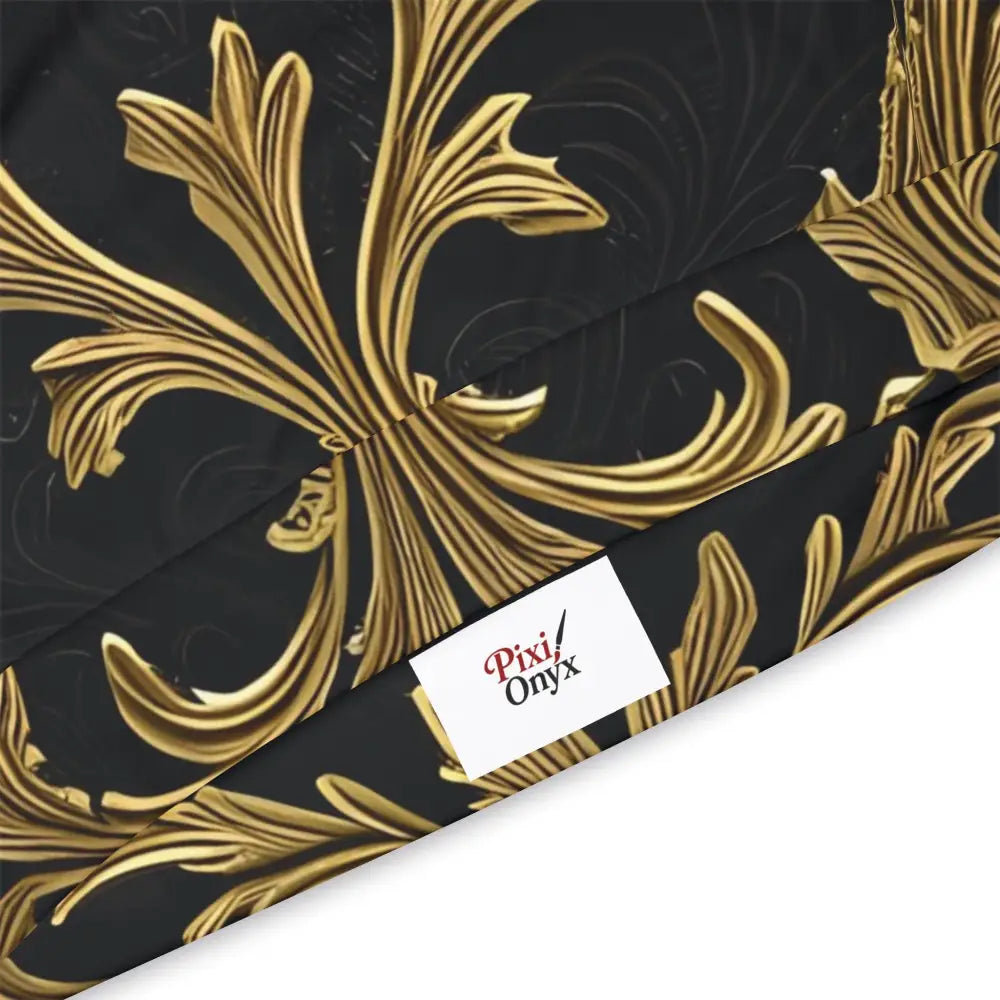 Black and gold floral patterned fabric on Gilded Veil Hoodie with Elegant Gold Baroque Design