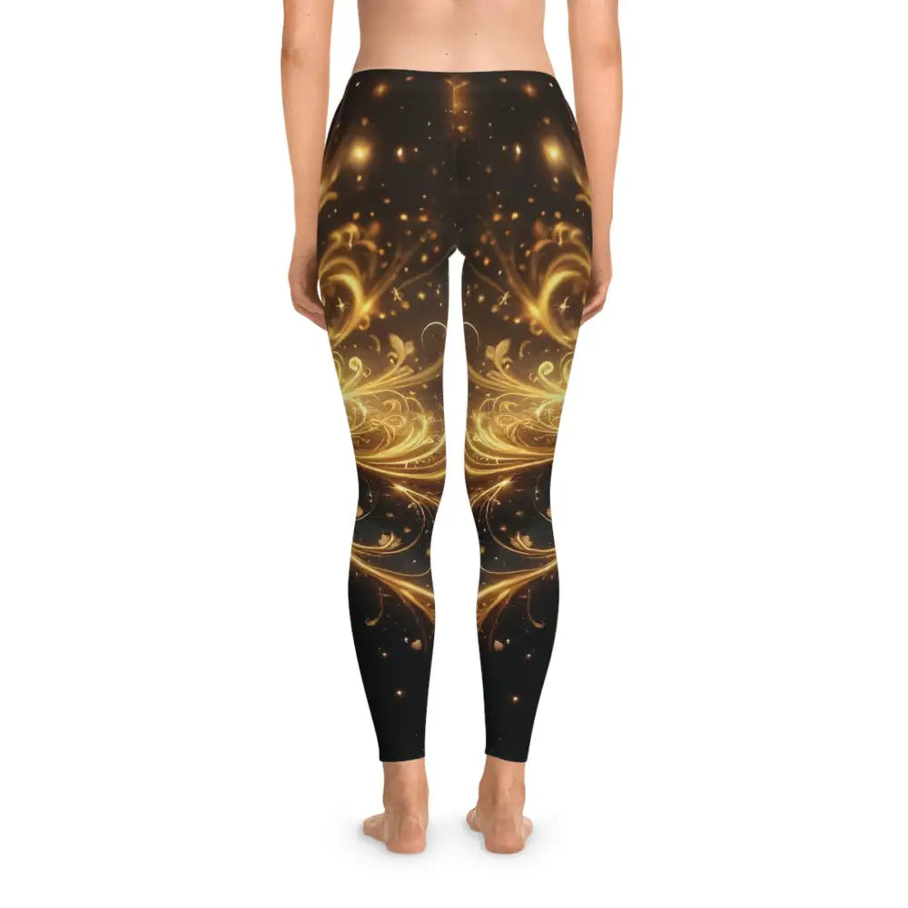 Woman’s leggings with golden floral design from Golden Filigree Flow Luxe AOP Baroque Swirl PixiOnyx Activewear