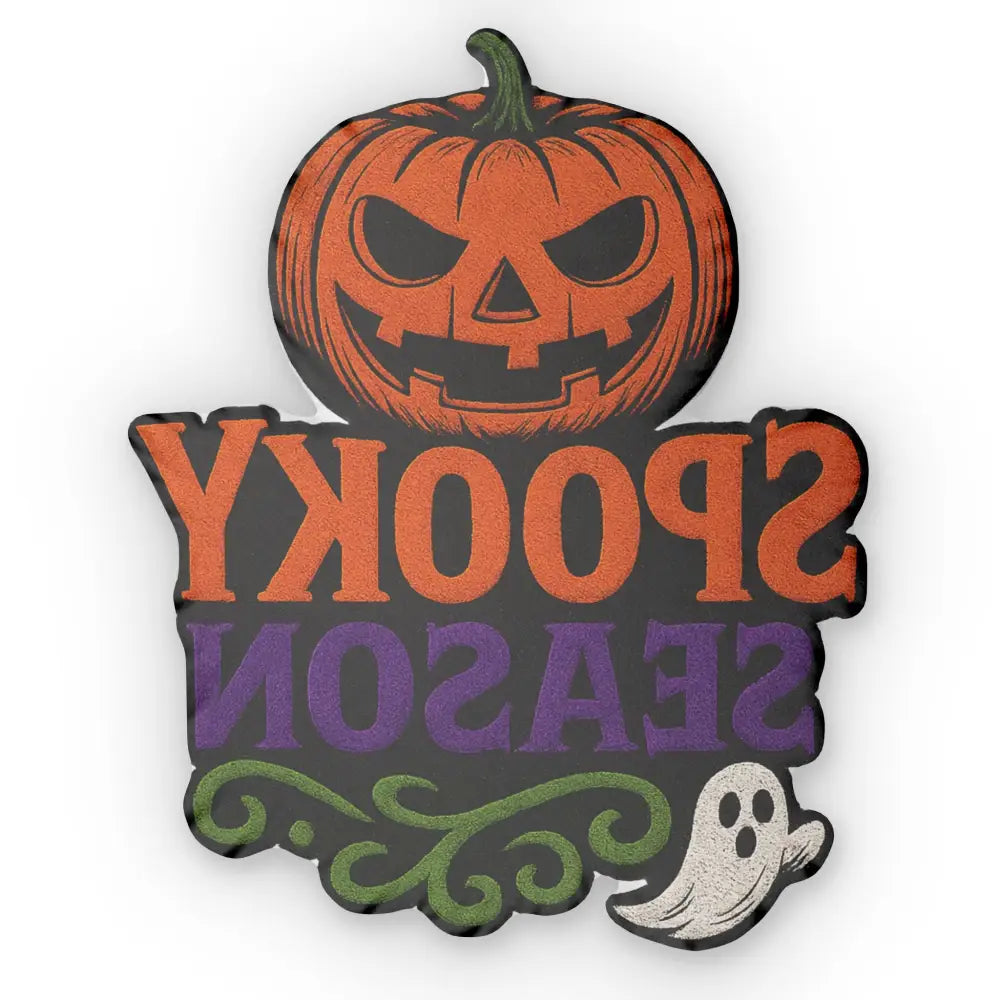 Halloween-themed sign with fiery pumpkin-shaped pillow and ghost for ultimate spooky-season energy