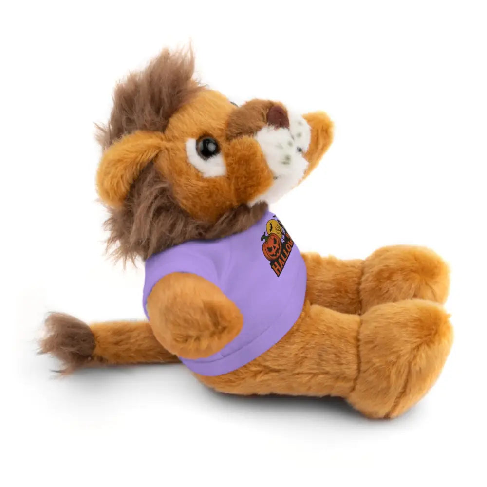 Brown stuffed lion wearing purple T-shirt from PixiOnyx Haunted House collectible plush