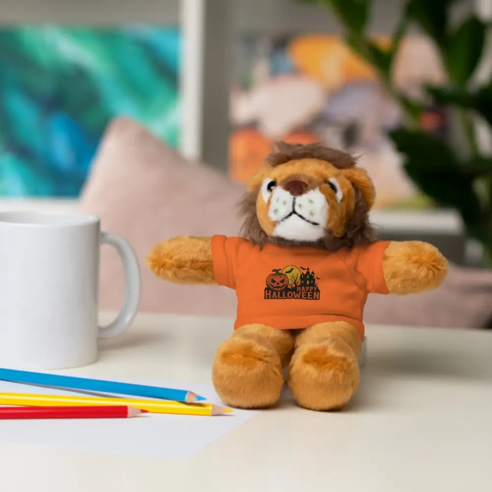 Plush lion wearing Halloween orange tee from PixiOnyx haunted house collectible plush