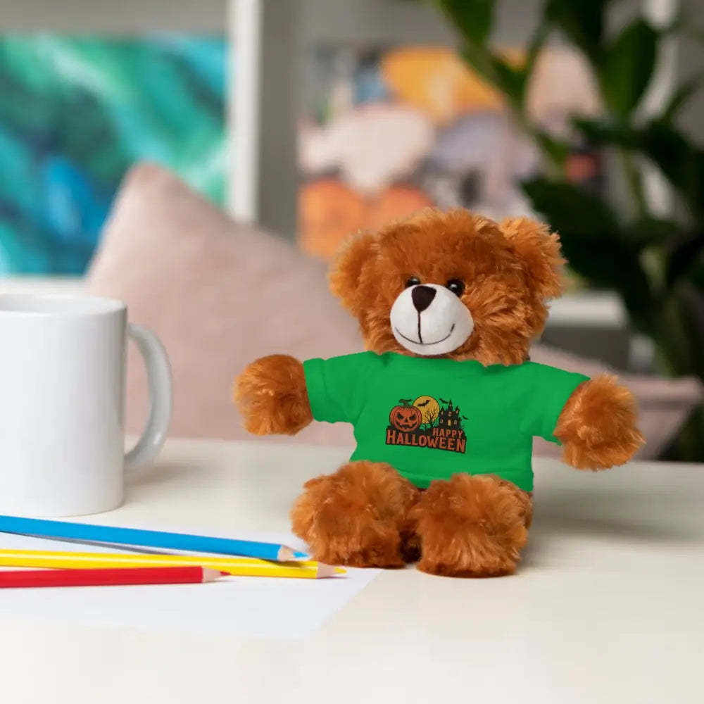 Fluffy brown teddy bear wearing a Halloween haunted house tee, collectible plush toy