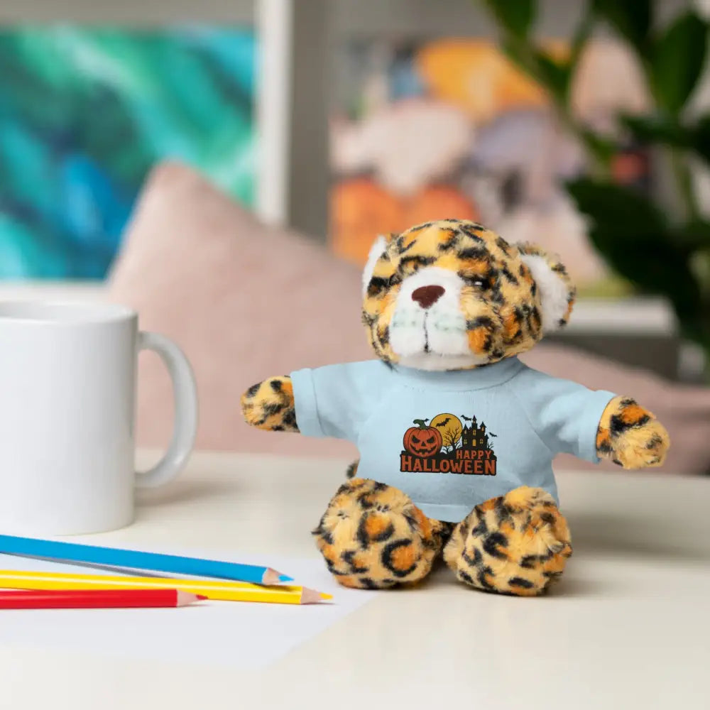 Leopard print plush toy wearing a light blue T-shirt from PixiOnyx haunted house collectible stuffed animal collection