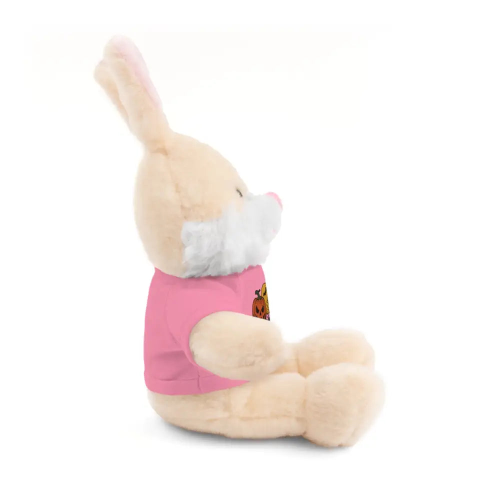 Cream-colored stuffed bunny wearing pink pumpkin haunted house tee collectible plush toy