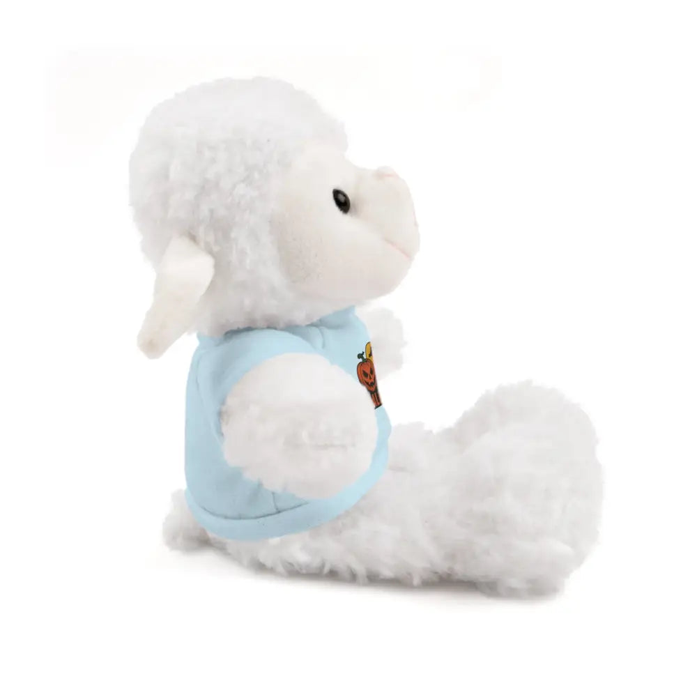 White fluffy haunted house stuffed animal wearing a light blue collectible plush tee
