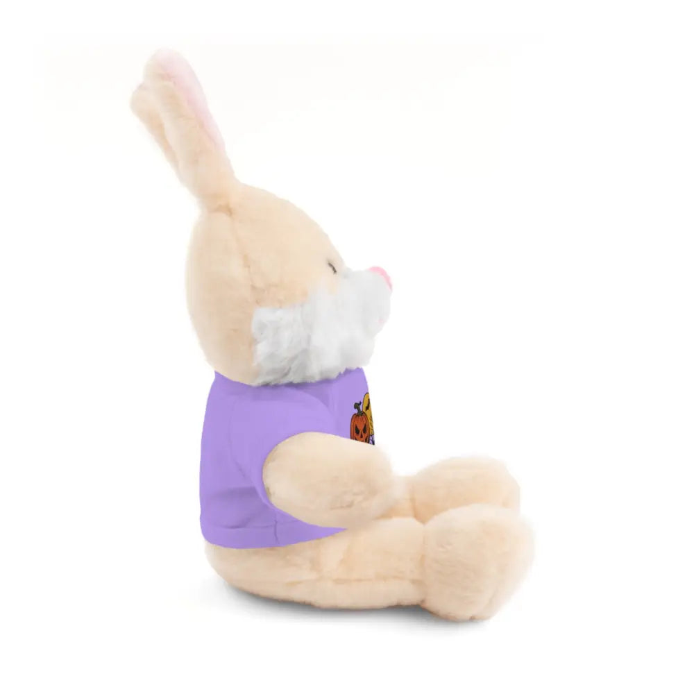 Light brown plush bunny wearing purple pumpkin haunted house tee, collectible stuffed animal