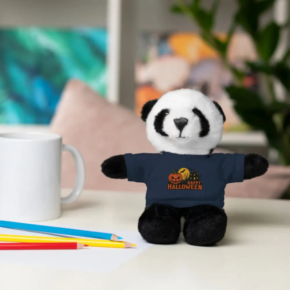 Plush panda wearing a navy blue Happy Halloween T-shirt featuring haunted house design