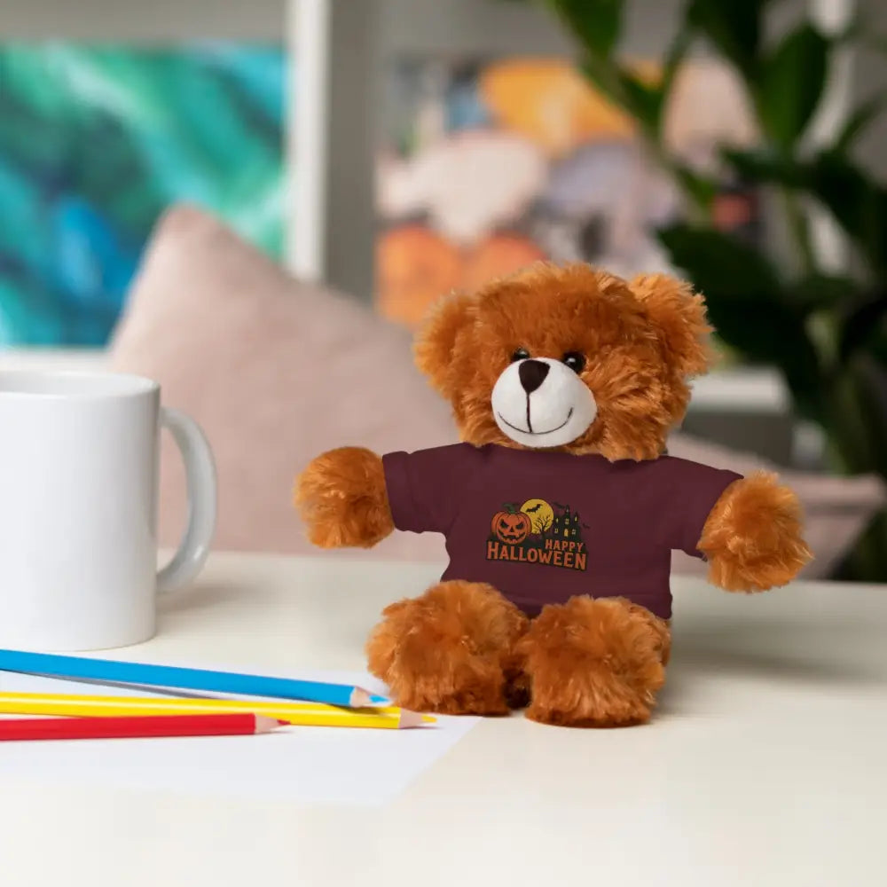 Brown plush teddy bear wearing a Halloween Tee with haunted house design, collectible plush toy