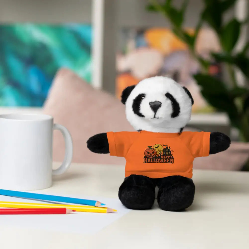 Plush panda wearing orange T-shirt with haunted house design in PixiOnyx collectible plush