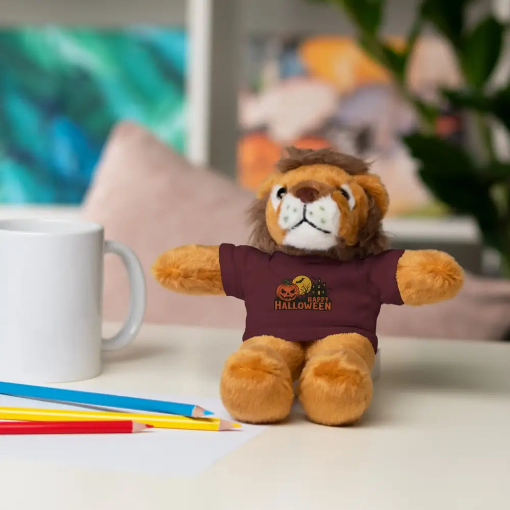 Plush lion stuffed animal wearing maroon Halloween haunted house graphic tee for collectible plush