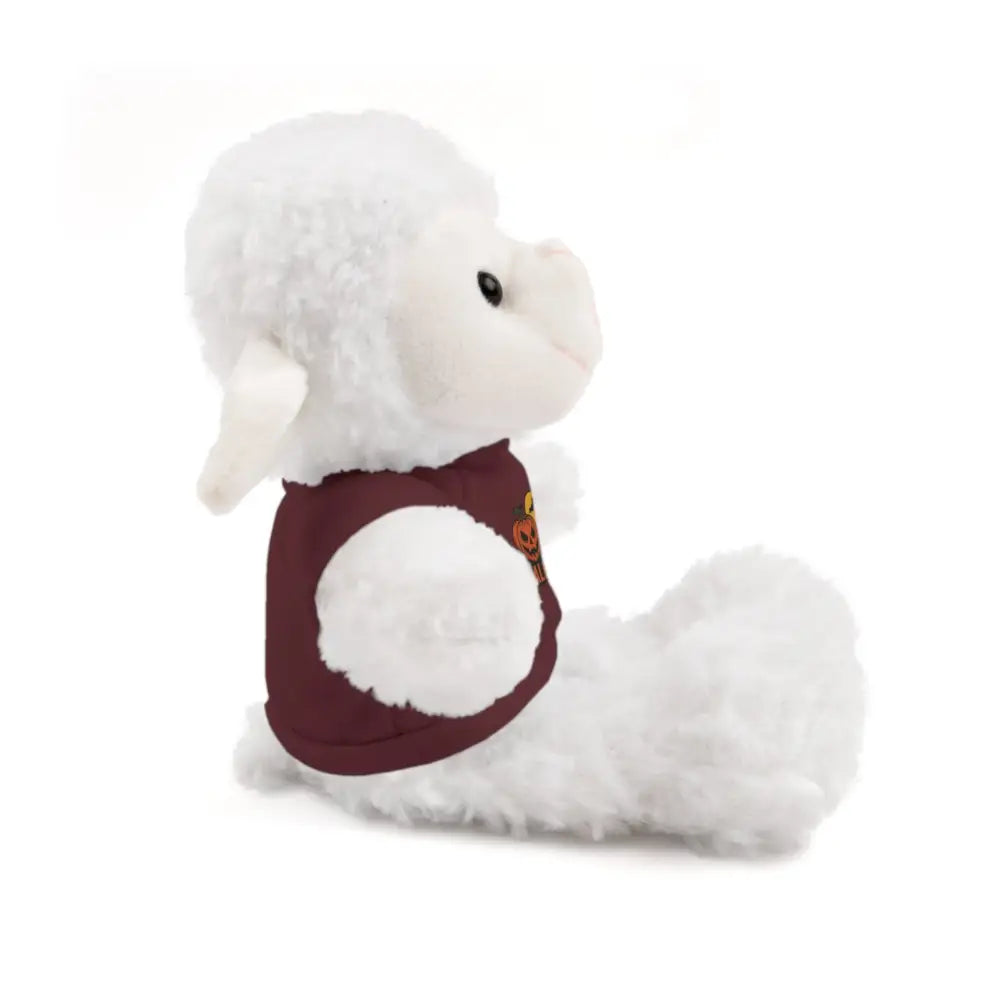 White plush lamb wearing a maroon vest with pumpkin haunted house design collectible plush