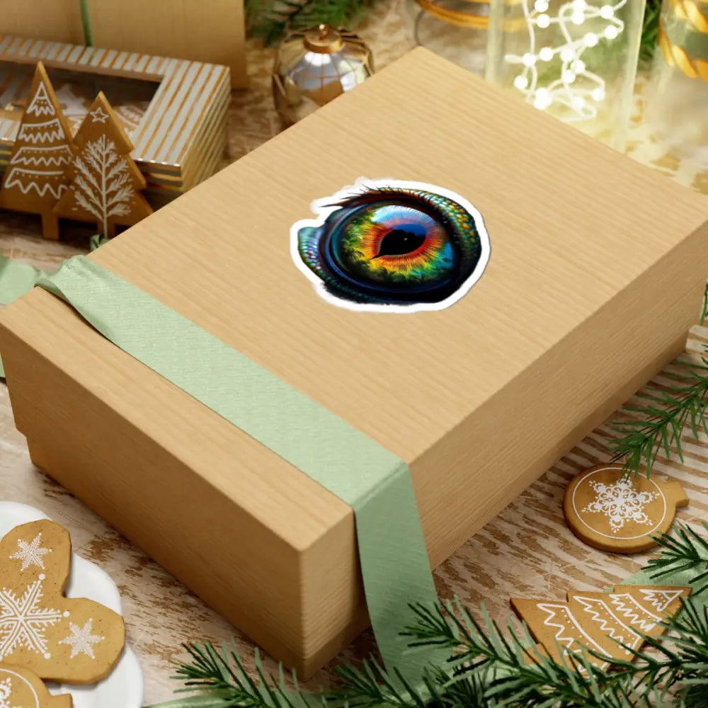 Wrapped gift box with vibrant eye sticker from PixiOnyx CreatureVision Series