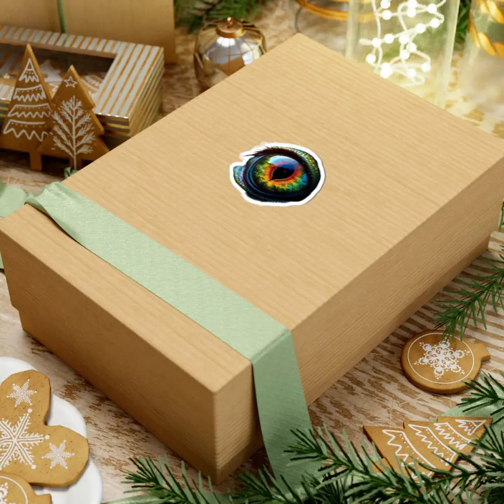 Wrapped gift box with vibrant eye sticker from PixiOnyx CreatureVision Series