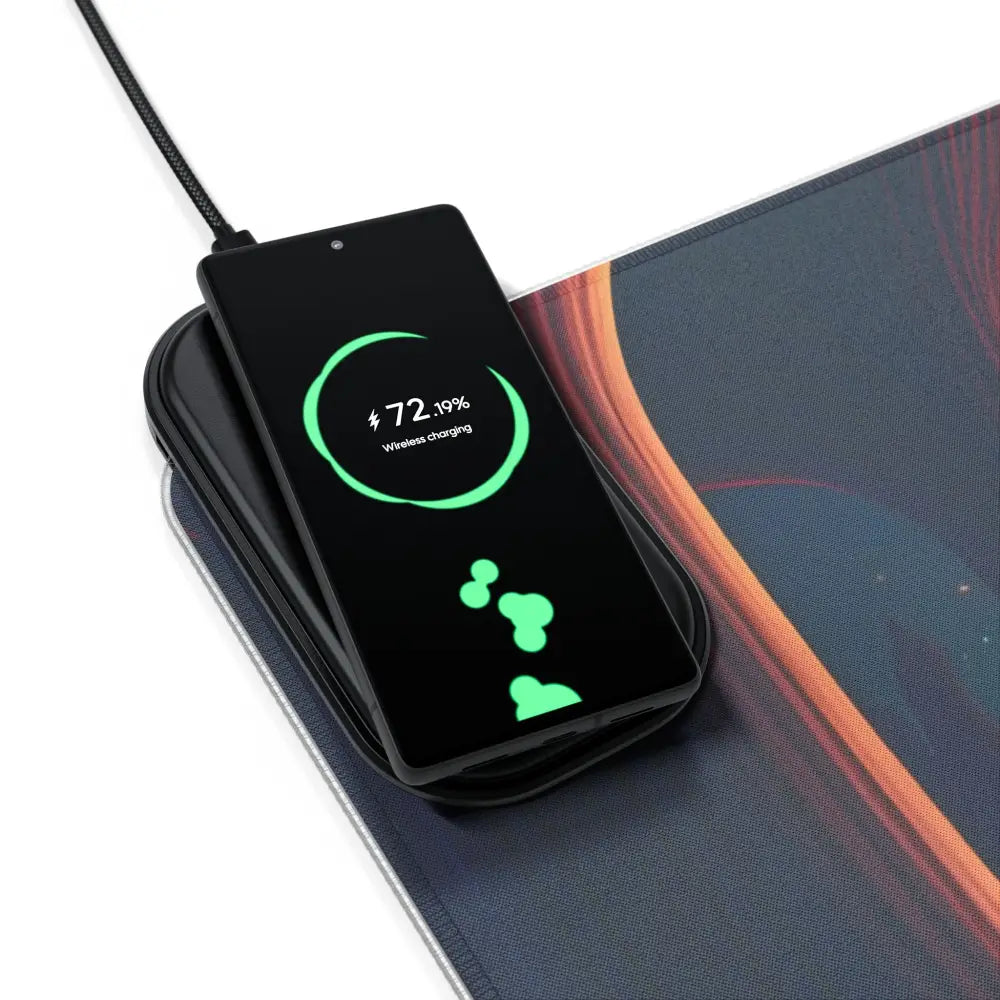 Black smartphone wirelessly charging on LED Gaming Mouse Pad Mushroom Valley Mindwalk PixiOnyx