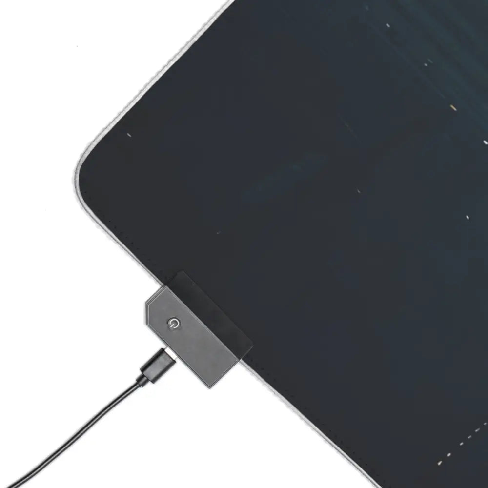 Tablet charging with USB-C cable on PIXIONYX LED Gaming Mouse Pad Neon RGB Cyberpunk