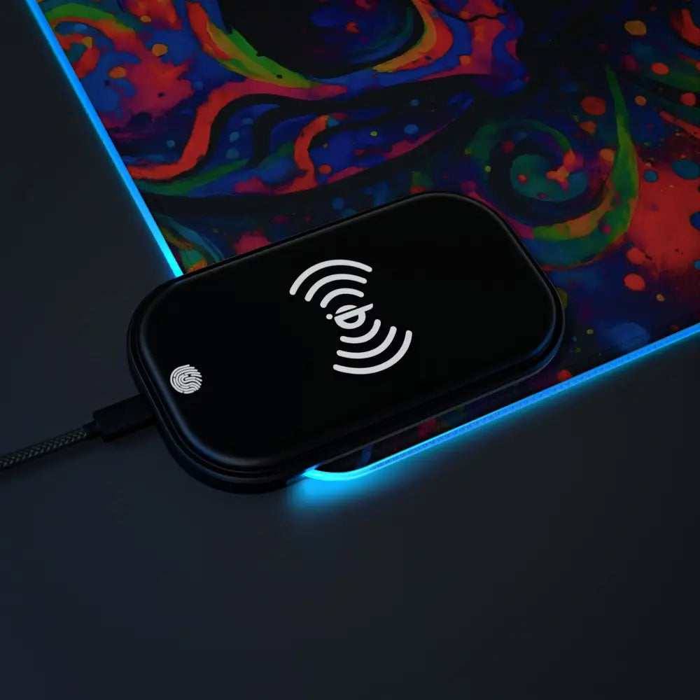 Black wireless charging pad on LED Gaming Mouse Pad Psychedelic Skull Glow by PixiOnyx