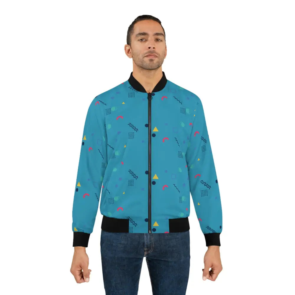 Man wearing a Turquoise Memphis Razzle Pop patterned bomber jacket from PixiOnyx Retrocore Outerwear