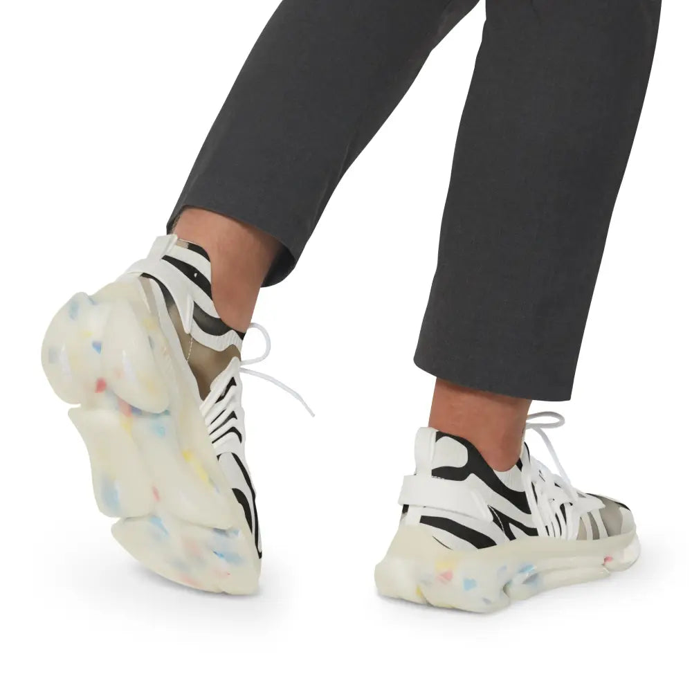 White and black athletic shoes from Men’s Sneakers Nightstripe Pulse PixiOnyx Monochrome series