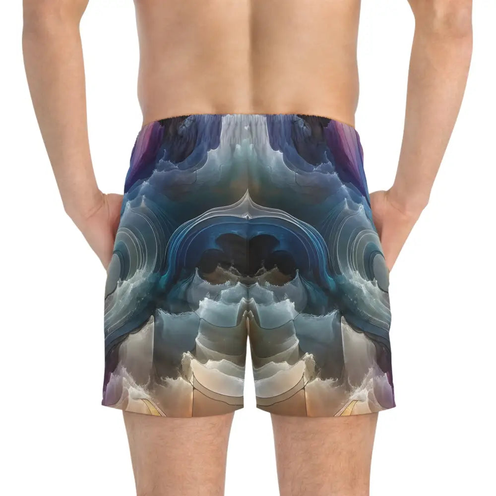 Abstract-patterned men’s swim trunks from PixiOnyx Surreal Swimwear Celestial Layer Flux