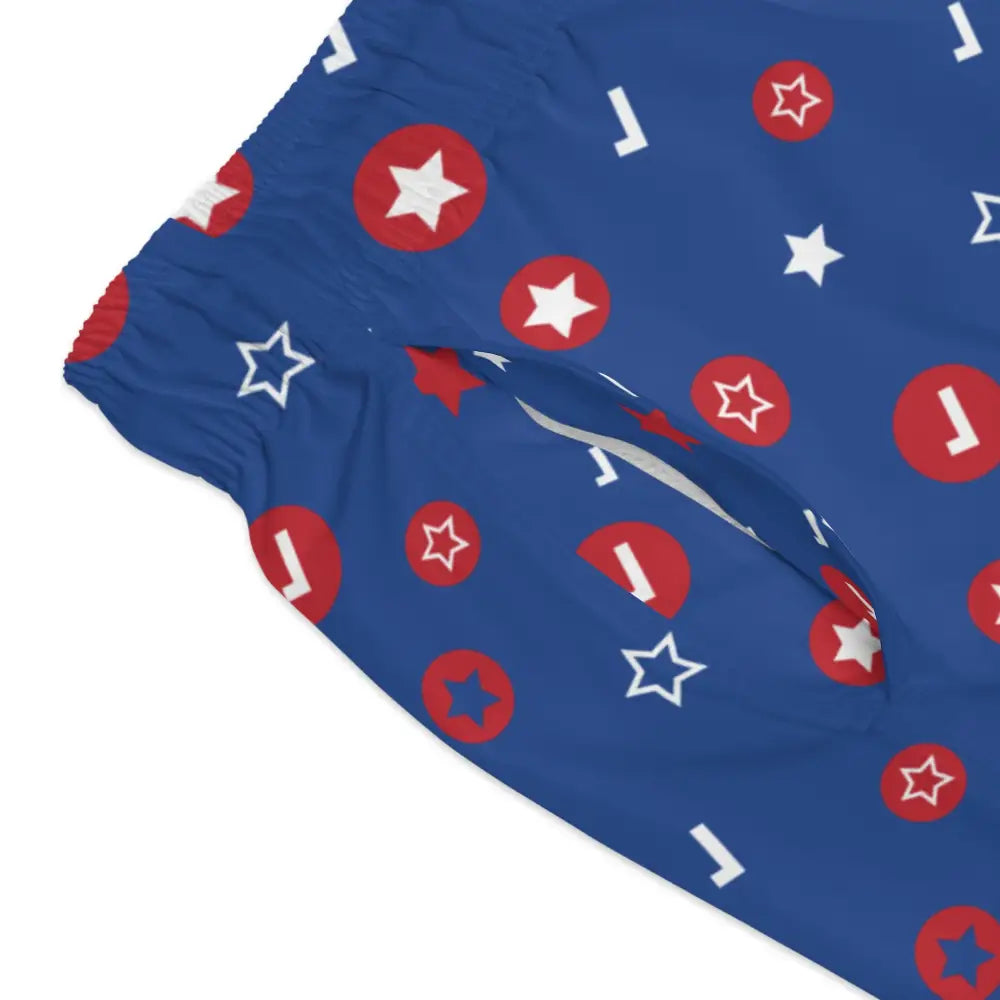 Blue men’s swim trunks with star and circle cosmic confetti pattern from PixiOnyx Festival Swimwear