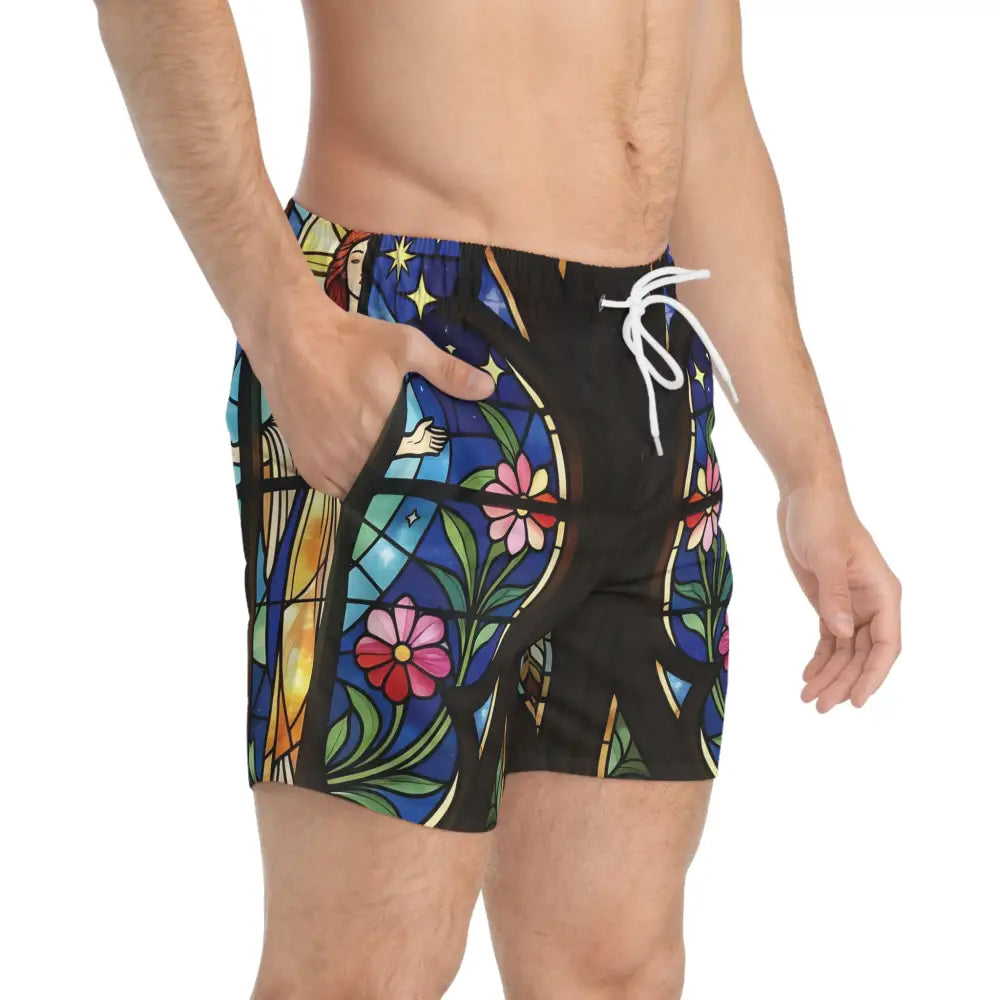 Stained-glass-patterned men’s swim trunks from Divine Radiance collection by PixiOnyx