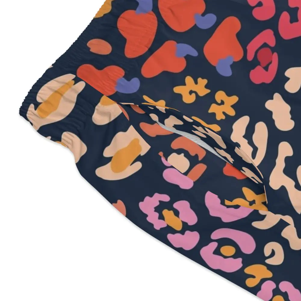 Patterned casual pants styled in Men’s Swim Trunks Neon Safari Print by PixiOnyx Apex Poolwear