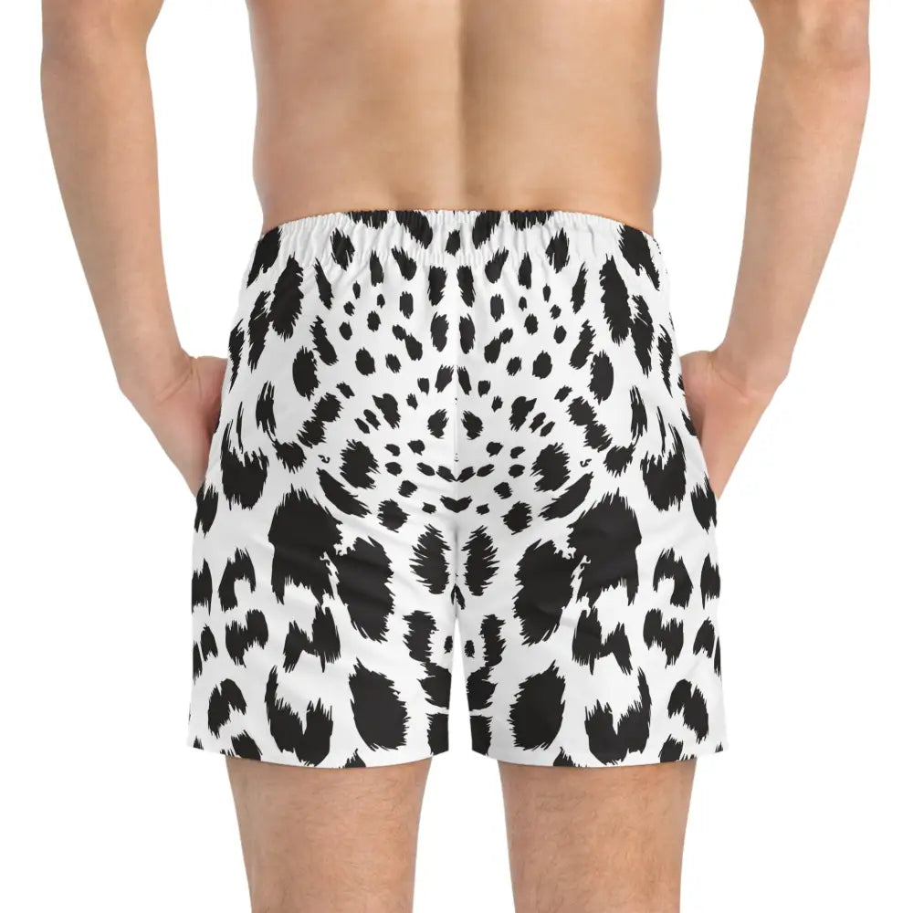 Black and white spotted boxer shorts featured in PixiOnyx Monochrome Beachwear men’s swim trunks